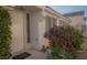 Charming front entrance with neat landscaping, inviting guests to this well-kept home at 9323 W Rochelle Ave, Las Vegas, NV 89147