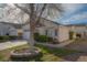 Charming home with mature landscaping, driveway, and a two car garage at 9323 W Rochelle Ave, Las Vegas, NV 89147