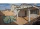 Backyard featuring a small pool and a covered patio area at 9323 W Rochelle Ave, Las Vegas, NV 89147