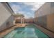 Backyard pool is surrounded by patio space for relaxing and entertaining guests at 9323 W Rochelle Ave, Las Vegas, NV 89147