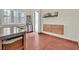 Bonus room with shuttered windows, built-in cabinets, and rust-colored floors at 104 N Royal Ascot Dr, Las Vegas, NV 89144