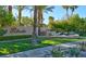 The Palisades community sign with water feature and lush landscaping at 104 N Royal Ascot Dr, Las Vegas, NV 89144