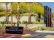 Downtown Summerlin sign in a beautifully landscaped roundabout with palm trees at 104 N Royal Ascot Dr, Las Vegas, NV 89144
