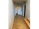 Hallway with wood floors connecting various rooms at 11005 Edina Ct, Las Vegas, NV 89144