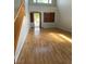 Bright living room features wood floors, high ceilings, and natural light at 11005 Edina Ct, Las Vegas, NV 89144