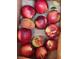 A delightful assortment of colorful and ripe peaches arranged artfully in an inviting display at 11005 Edina Ct, Las Vegas, NV 89144