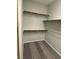 Spacious walk-in closet with shelving, providing lots of room for organizing clothes, shoes, and accessories at 11005 Edina Ct, Las Vegas, NV 89144