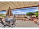 Inviting outdoor space featuring a covered patio with scenic views and comfortable seating arrangements at 2167 Fairweather St, Henderson, NV 89052