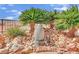 Rock garden fountain surrounded by decorative rocks and desert plants at 2167 Fairweather St, Henderson, NV 89052