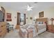 Cozy bedroom featuring natural light, ceiling fan, and traditional furnishings and decor at 2167 Fairweather St, Henderson, NV 89052