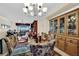 Open dining area with stylish furnishings and view to living room at 2167 Fairweather St, Henderson, NV 89052