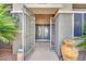Elegant front entrance featuring double doors and a decorative wrought iron gate, providing security and style at 2167 Fairweather St, Henderson, NV 89052