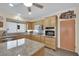 Bright kitchen with stainless appliances, granite countertops, and a functional layout at 2167 Fairweather St, Henderson, NV 89052