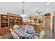 Breakfast area with views to the kitchen and wooden bookshelves at 2167 Fairweather St, Henderson, NV 89052