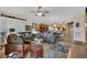 Open-concept living area with hardwood floors and neutral tones offers a welcoming space for relaxation and entertainment at 2167 Fairweather St, Henderson, NV 89052