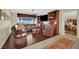 Inviting living room featuring hardwood floors, custom built-ins, and a cozy fireplace at 2167 Fairweather St, Henderson, NV 89052