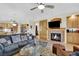 Inviting living area with fireplace, hardwood floors, and neutral tones provides a cozy atmosphere at 2167 Fairweather St, Henderson, NV 89052