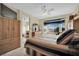 Comfortable primary suite featuring a bay window, ceiling fan, and carpeted floor for ultimate comfort at 2167 Fairweather St, Henderson, NV 89052