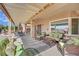 Expansive patio featuring ample seating, dining, and a built-in grill, perfect for outdoor entertaining at 2167 Fairweather St, Henderson, NV 89052