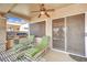 Comfortable covered patio with lounge chairs and built-in outdoor kitchen is ideal for relaxing at 2167 Fairweather St, Henderson, NV 89052