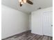 Bedroom with hard surface floors, white walls, and a ceiling fan at 2200 S Fort Apache Rd # 2023, Las Vegas, NV 89117