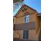 Exterior view of a well-maintained condo building showcasing its architectural details and convenient access to upper-level units at 2200 S Fort Apache Rd # 2023, Las Vegas, NV 89117
