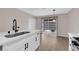 The dining area has an adjacent kitchen and a sliding glass door leading to the backyard at 255 N Lamb Blvd # F, Las Vegas, NV 89110