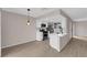 Bright kitchen features stainless appliances, modern white cabinets, and wood-look flooring at 255 N Lamb Blvd # F, Las Vegas, NV 89110
