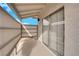 Enclosed patio with a sliding glass door and privacy screen, offering a tranquil outdoor retreat at 255 N Lamb Blvd # F, Las Vegas, NV 89110