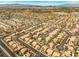 Expansive aerial view showcasing a neighborhood with tidy streets and uniform rooftops at 2766 Chokecherry Ave, Henderson, NV 89074