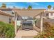 Backyard features a hot tub under a pergola surrounded by desert landscaping at 2766 Chokecherry Ave, Henderson, NV 89074