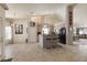 Open kitchen area with a breakfast bar, black appliances, and access to the living spaces at 2766 Chokecherry Ave, Henderson, NV 89074