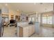 Inviting kitchen area leading into a living room with a cozy fireplace, perfect for relaxing and entertaining at 2766 Chokecherry Ave, Henderson, NV 89074