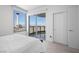 Bright bedroom featuring city views, closet space, and neutral decor at 322 Karen Ave # 1507, Las Vegas, NV 89109