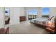 Spacious bedroom with a large window showcasing mountain views and access to a private balcony at 322 Karen Ave # 1507, Las Vegas, NV 89109