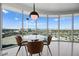 Dining area with floor-to-ceiling windows and a striking city view, enhancing the dining experience at 322 Karen Ave # 1507, Las Vegas, NV 89109