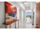 Well-lit hallway with modern decor leading to living spaces with city views at 322 Karen Ave # 1507, Las Vegas, NV 89109