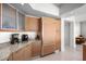 Kitchen area features granite countertops, modern appliances, and seamlessly connects to a desk area at 322 Karen Ave # 1507, Las Vegas, NV 89109