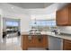 Stylish kitchen showcasing granite countertops, stainless appliances, and a view of the city skyline at 322 Karen Ave # 1507, Las Vegas, NV 89109
