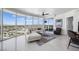 Bright living room with floor-to-ceiling windows and city views, with a modern sectional sofa at 322 Karen Ave # 1507, Las Vegas, NV 89109