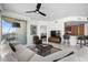 Open living area featuring contemporary furnishings and an adjacent kitchen with breakfast bar at 322 Karen Ave # 1507, Las Vegas, NV 89109