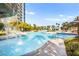 Stunning swimming pool with rock waterfall features and lush landscaping surrounded by resort amenities at 322 Karen Ave # 1507, Las Vegas, NV 89109
