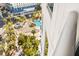 Beautiful view from a high rise balcony of a large pool and gazebo with mature landscaping at 322 Karen Ave # 1507, Las Vegas, NV 89109