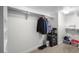 Spacious walk-in closet with built-in shelving and hanging rods for organized storage at 322 Karen Ave # 1507, Las Vegas, NV 89109