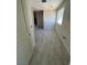 Hallway leading to bedroom featuring tile floors at 331 Huracan St, Pahrump, NV 89048
