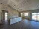 Spacious living room with modern flooring and large windows for plenty of natural light at 331 Huracan St, Pahrump, NV 89048