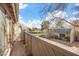 Balcony offers a cozy outdoor space with views of the neighborhood and mature trees at 3365 Zephyr Ct, Las Vegas, NV 89121