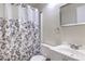 Updated bathroom featuring a modern sink, shower with a trendy curtain, and updated fixtures at 3365 Zephyr Ct, Las Vegas, NV 89121