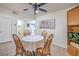 Cozy dining area with wood table and chairs, adjacent to kitchen at 3365 Zephyr Ct, Las Vegas, NV 89121