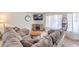 Comfortable living room with sectional sofa, fireplace, and lots of space at 3365 Zephyr Ct, Las Vegas, NV 89121